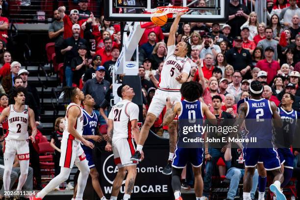 Darrion Williams of the Texas Tech Red Raiders dunks the ball during the second half against the TCU Horned Frogs at United Supermarkets Arena on...