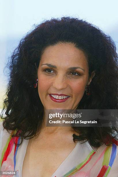 Actress Farida Rahouadj poses for the cameras at the photocall for the film "Les Cotelettes" during the 56th Cannes Film Festival on May 24, 2003 at...