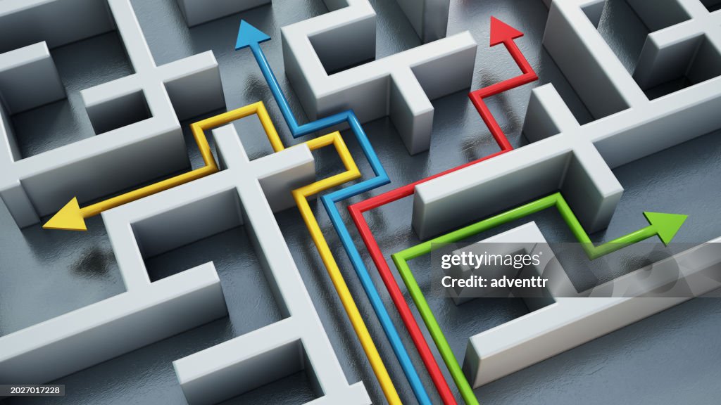 Yellow, blue, red and green lines with arrows leading through different ways in a maze. Choice concept