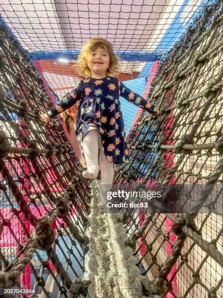 two year old girl lifestyle shoot - hanging bridge stock pictures, royalty-free photos & images