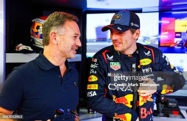 Max Verstappen of the Netherlands and Oracle Red Bull Racing talks with Red Bull Racing Team Principal Christian Horner in the garage during day one...