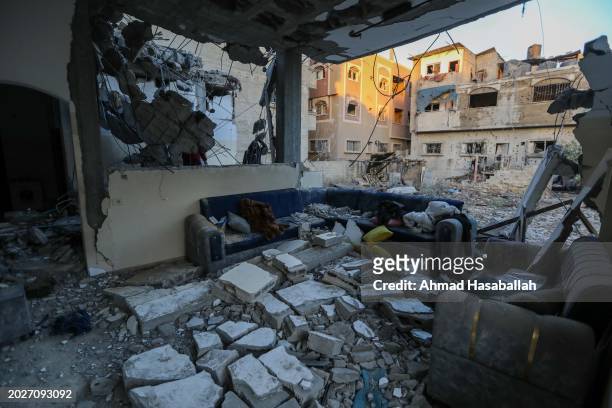 Debris is seen in a damaged building following Israeli air strikes on February 21, 2024 in Rafah, Gaza. Strikes have intensified as Israel reiterated...