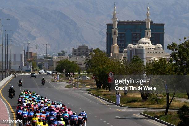 General view of the peloton competing close to the Sultan bin Saqr Al Qasimi new Mosque in Ras Al Khaimah downtown during the 6th UAE Tour 2024,...