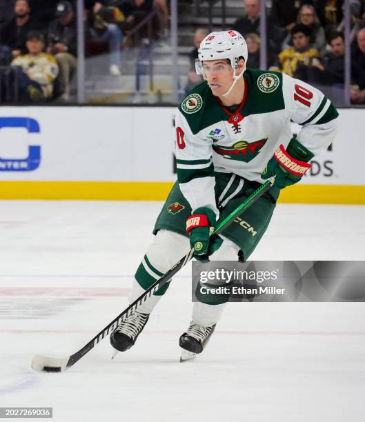 Vinni Lettieri of the Minnesota Wild skates with the puck against the Vegas Golden Knights in the third period of their game at T-Mobile Arena on...