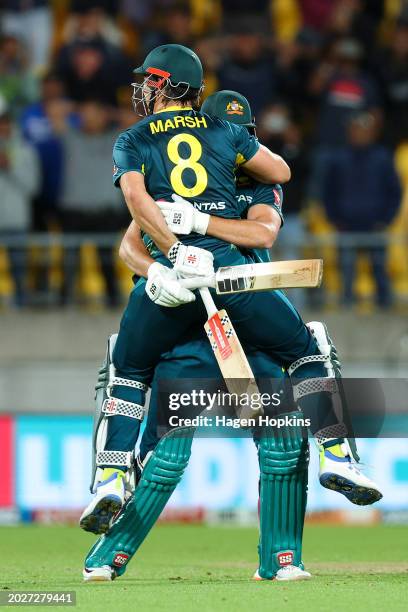 Mitchell Marsh and Tim David of Australia celebrate the win during game one of the Men's T20 International series between New Zealand and Australia...