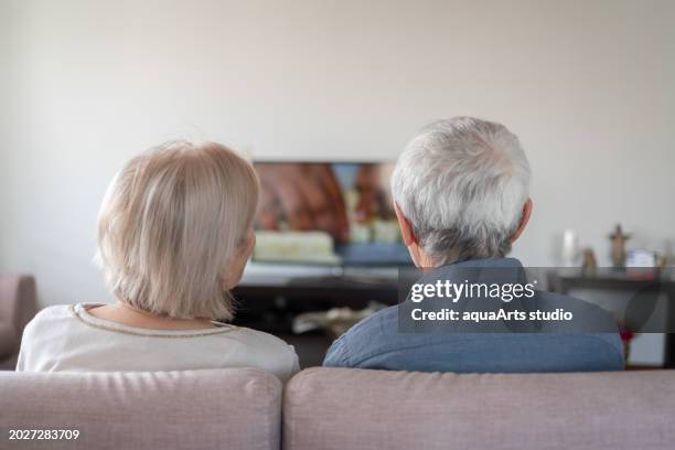 senior couple spending time together - controlling wife stock pictures, royalty-free photos & images