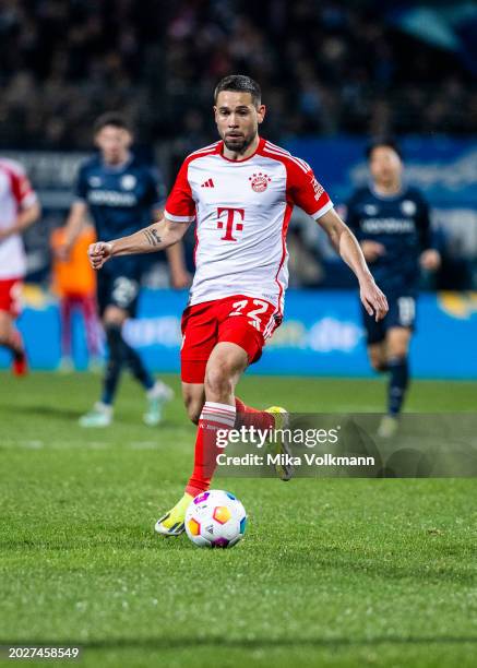 Raphael Guerreiro of Muenchen runs with the ball during the Bundesliga match between VfL Bochum 1848 and FC Bayern Muenchen at Vonovia Ruhrstadion on...