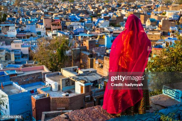 young indian woman looking at the view, jodhpur, india - south asia city scape stock pictures, royalty-free photos & images