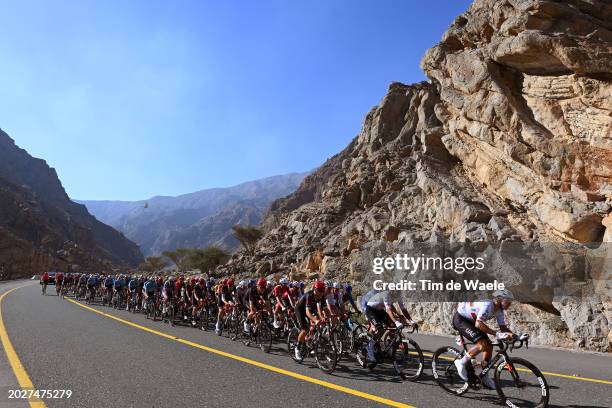 Juan Sebastian Molano of Colombia, Brandon McNulty of The United States and Team UAE Emirates - Red Leader Jersey a general view of the peloton...