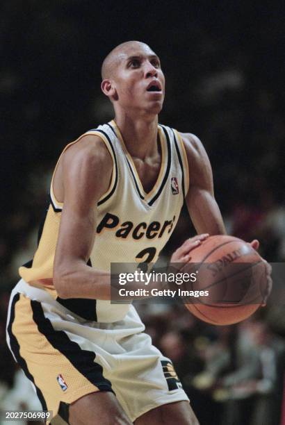 Reggie Miller, Shooting Guard for the Indiana Pacers prepares to make a free throw shot during the NBA Central Division basketball game against the...