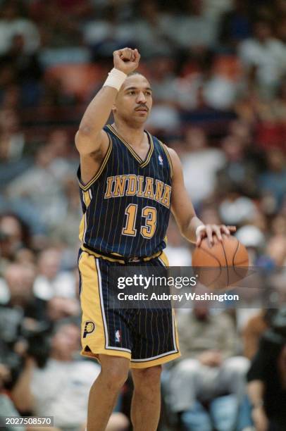 Mark Jackson, Point Guard for the Indiana Pacers makes a clenched fist hand signal during the NBA Pacific Division basketball game against the Los...