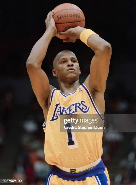 Anthony Peeler, Shooting Guard for the Los Angeles Lakers prepares to make a free throw shot during the NBA Pacific Division basketball game against...