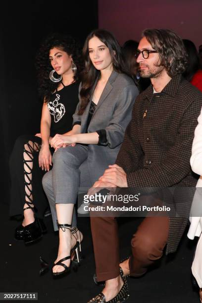 Spanish actress Mina El Hammani, American actress Ella Travolta and the editor of Vanity Fair Simone Marchetti guests at the Twinset fashion show at...