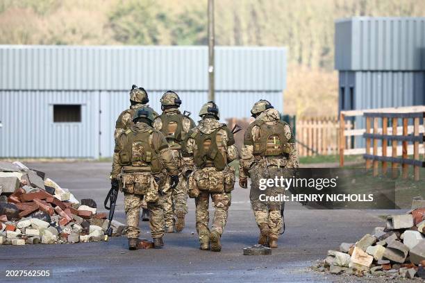 Ukrainian soldiers take part in a training excercise operated by Britain's armed forces as part of the Interflex programme, in eastern England, on...