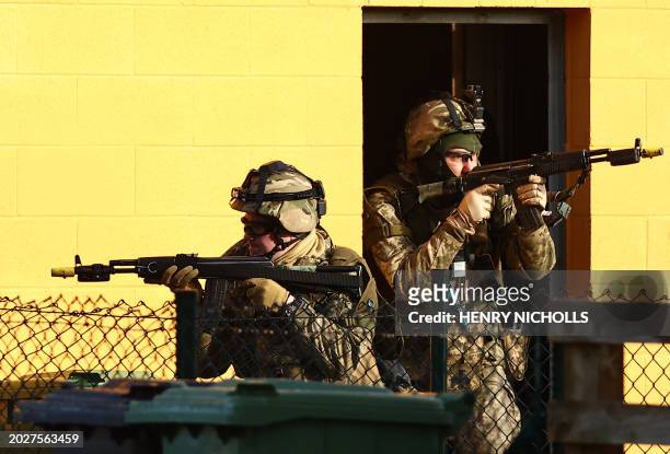 Ukrainian soldiers take part in a training excercise operated by Britain's armed forces as part of the Interflex programme, in eastern England, on...