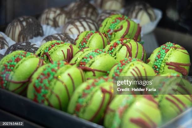 brownish green macarons - chocolate easter egg isolated stock pictures, royalty-free photos & images