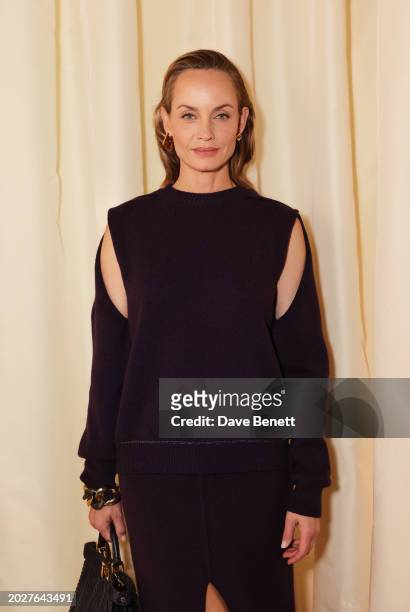 Amber Valletta attends the Fendi fashion show during Milan Fashion Week Womenswear Fall/Winter 2024-2025 on February 21, 2024 in Milan, Italy.
