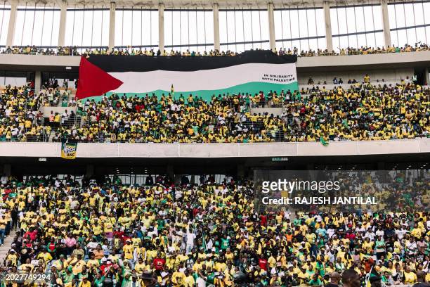 Palestinian flag is seen among thousands of African National Congress during the Election Manifesto launch at the Moses Mabhida Stadium in Durban on...