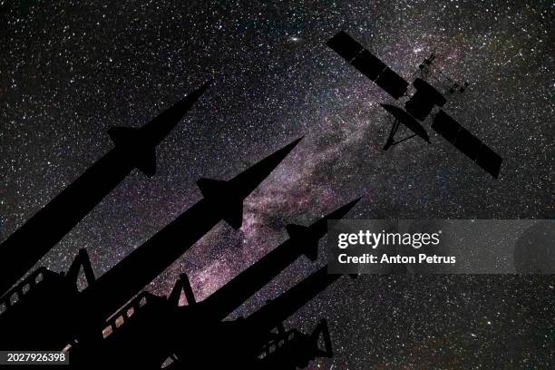 missile system and satellite in space - intercontinental ballistic missile stock pictures, royalty-free photos & images