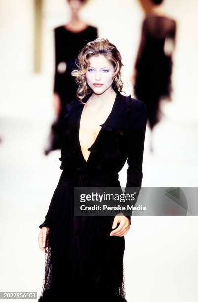 Model Emma Sjoberg walks in the Valentino Fall 1993 Ready to Wear Runway Show on March 17 in Paris, France.