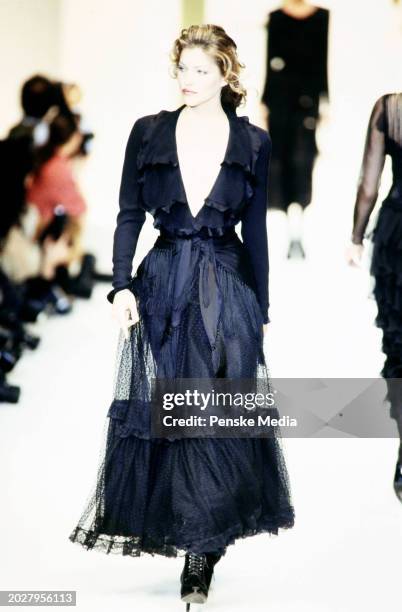 Model Emma Sjoberg walks in the Valentino Fall 1993 Ready to Wear Runway Show on March 17 in Paris, France.