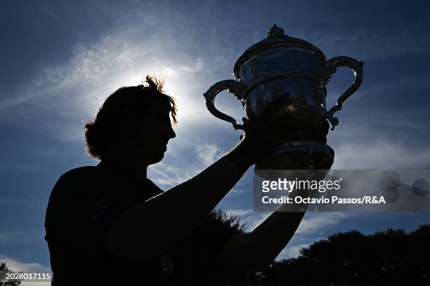 Altin Van Der Merwe of South Africa poses with the trophy following his victory in a playoff during day four of the Africa Amateur Championship and...