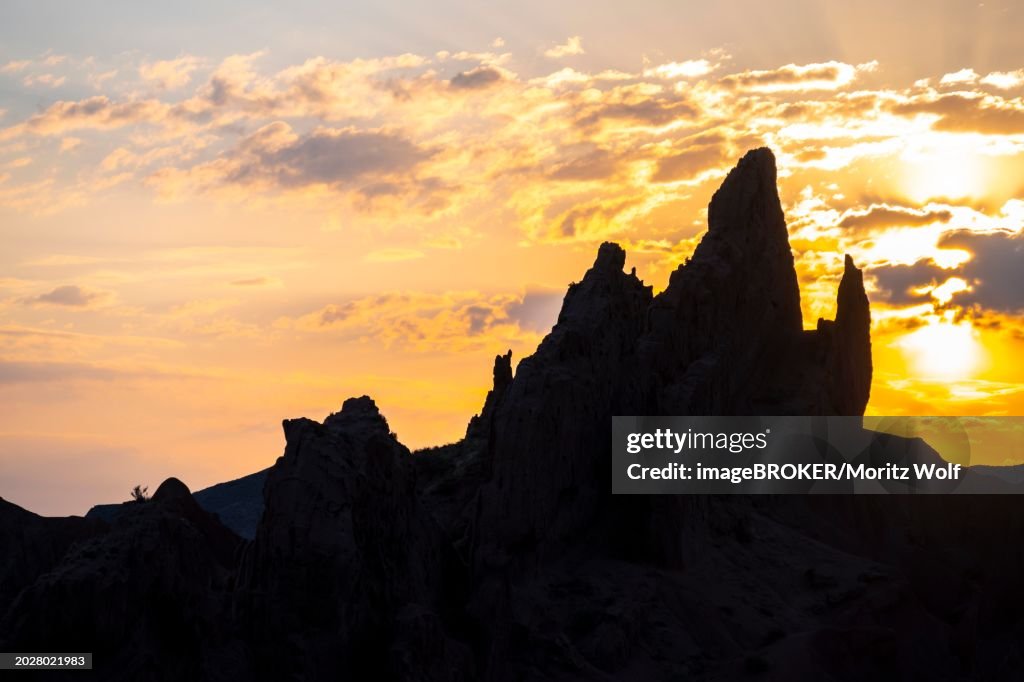Silhouette, canyon of eroded sandstone formations, red and orange sandstone rocks, fairytale gorge, Skazka, Tosor, Kyrgyzstan, Asia