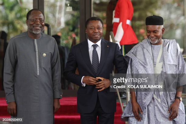 Togo President Faure Gnassingbé is received by President of Economic Community of West African States Commission , Omar Touray and Nigerian Minister...