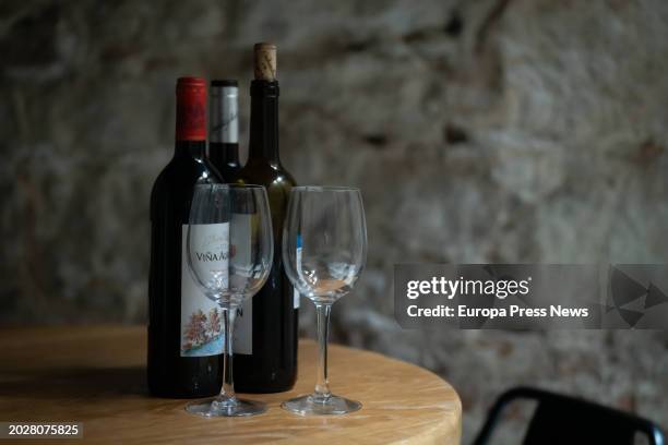 Three bottles of wine with two glasses, on 21 February, 2024 in Barcelona, Catalonia, Spain.