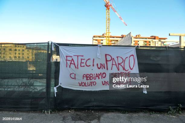 Banner written by the citizens on the net along the site of the collapse in the Esselunga supermarket building under construction that reads: 'Fateci...