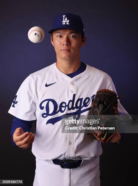 Yoshinobu Yamamoto of the Los Angeles Dodgers poses for a portrait during photo day at Camelback Ranch on February 21, 2024 in Glendale, Arizona.