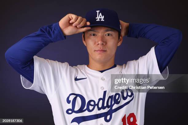 Yoshinobu Yamamoto of the Los Angeles Dodgers poses for a portrait during photo day at Camelback Ranch on February 21, 2024 in Glendale, Arizona.