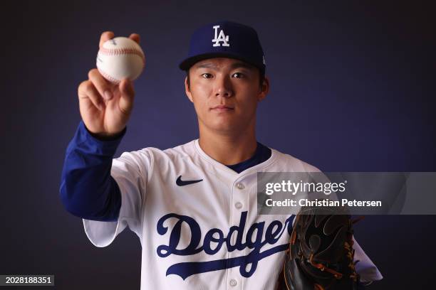 Yoshinobu Yamamoto of the Los Angeles Dodgers poses for a portrait during photo day at Camelback Ranch on February 21, 2024 in Glendale, Arizona.