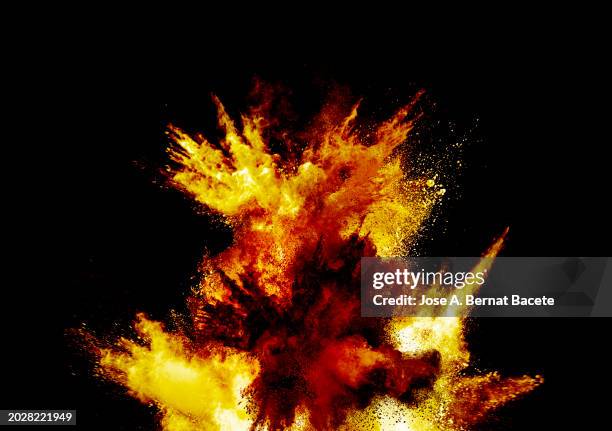 multiple ascending explosions of smoke and fire upon impact on a black background. - material-explosivo fotografías e imágenes de stock