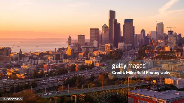 aerial seattle skyline and pioneer square sunset light - seattle pier stock pictures, royalty-free photos & images
