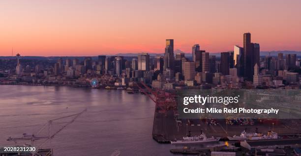 aerial seattle skyline and port at sunset - seattle pier stock pictures, royalty-free photos & images