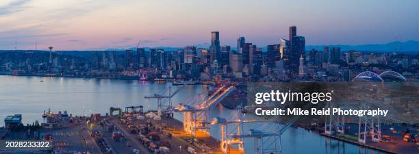 aerial puget sound seattle and port at blue hour - seattle pier stock pictures, royalty-free photos & images