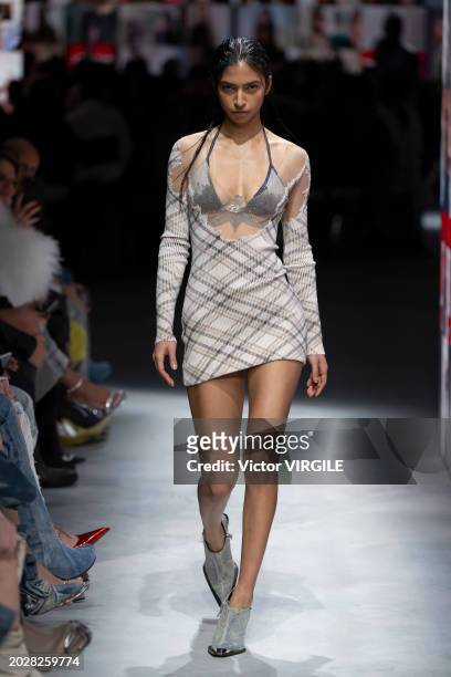 Model walks the runway during the Diesel Ready to Wear Fall/Winter 2024-2025 fashion show as part of the Milan Fashion Week on February 21, 2024 in...