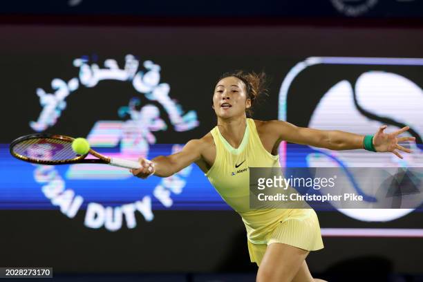 Qinwen Zheng of China plays a forehand against Anastasia Potapova in their third-round women's singles match during day 4 of the Dubai Duty Free...