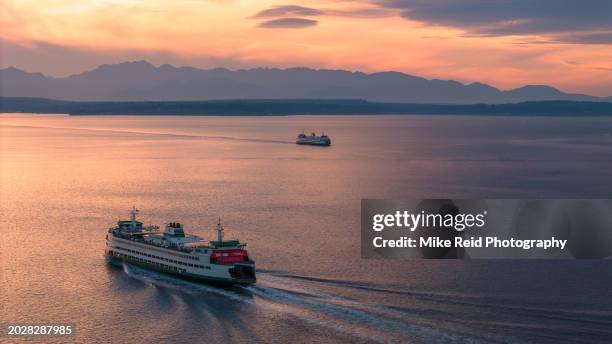 aerial washington state ferries on puget sound - seattle pier stock pictures, royalty-free photos & images