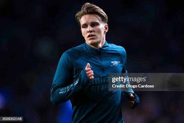 Martin Odegaard of Arsenal warms up prior to the UEFA Champions League 2023/24 round of 16 first leg match between FC Porto and Arsenal FC at Estadio...