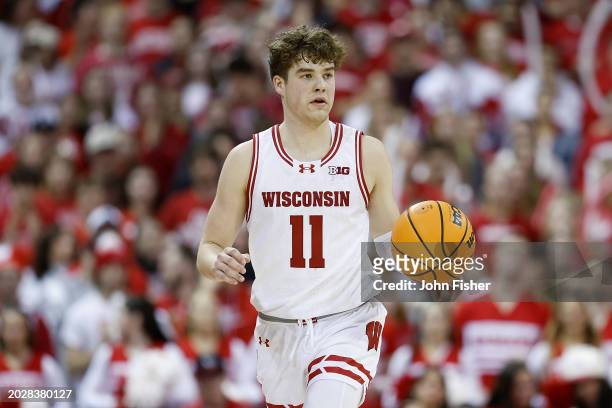 Max Klesmit of the Wisconsin Badgers dribbles up court in the second half of the game against the Maryland Terrapins at Kohl Center on February 20,...