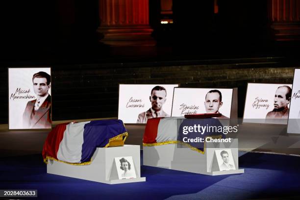 Coffins of Missak Manouchian and his wife Mélinee Manouchian lay outside the Pantheon monument as images are projected during the induction ceremony...