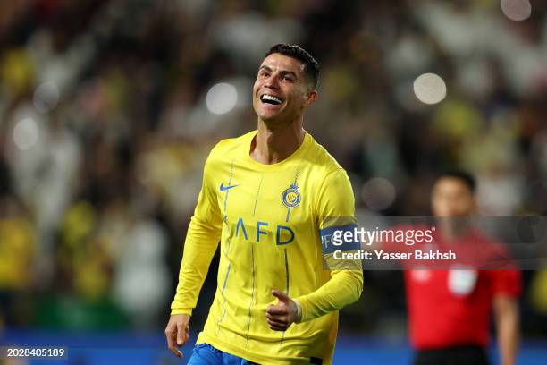 Cristiano Ronaldo of Al Nassr celebrates scoring his team's second goal during the second leg of the AFC Champions Leauge Round of 16 match between...