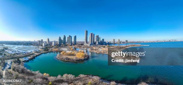 the view of humber bay shores skyline from waters of lake ontario, toronto, canada - etobicoke ontario stock pictures, royalty-free photos & images