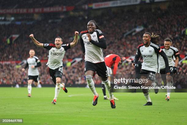 Calvin Bassey of Fulham celebrates after scoring their 1st goal during the Premier League match between Manchester United and Fulham FC at Old...