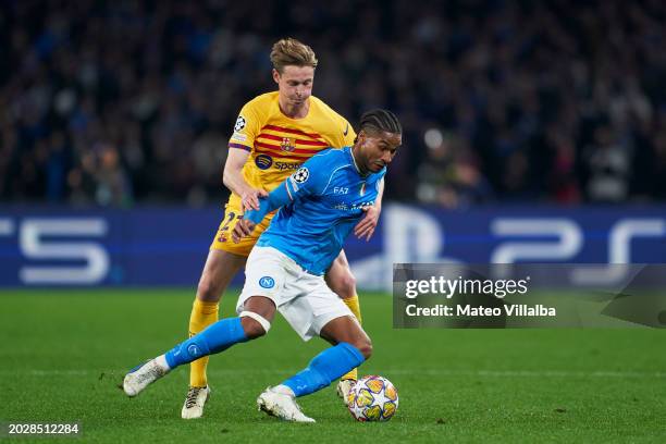 Jens Cajuste of SSC Napoli competes for the ball with Frenkie De Jong of FC Barcelona during the UEFA Champions League 2023/24 round of 16 first leg...