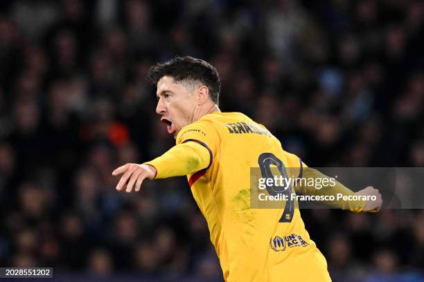 Robert Lewandowski of FC Barcelona celebrates scoring his team's first goal during the UEFA Champions League 2023/24 round of 16 first leg match...