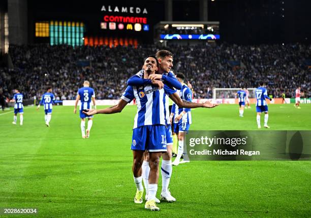 Galeno of FC Porto celebrates scoring his team's first goal with teammate Toni Martinez during the UEFA Champions League 2023/24 round of 16 first...