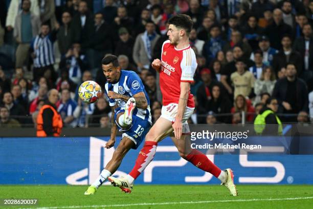 Galeno of FC Porto scores his team's first goal whilst under pressure from Declan Rice of Arsenal during the UEFA Champions League 2023/24 round of...